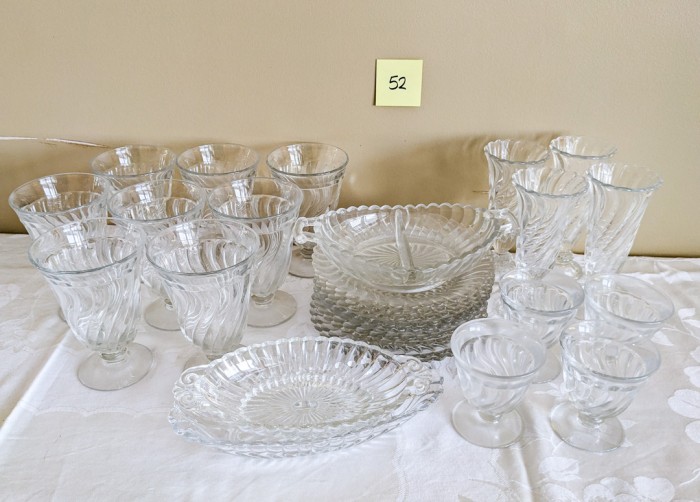 52. (9) Plates, (8) Glasses, (4) Sm. Glasses, (4) Champagne Glasses +  (3) Serving Pieces