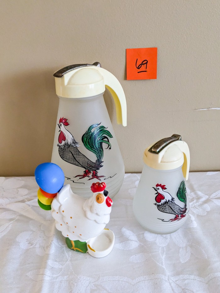 69. (2) Rooster Pitchers + Vintage Measuring Spoon Holder