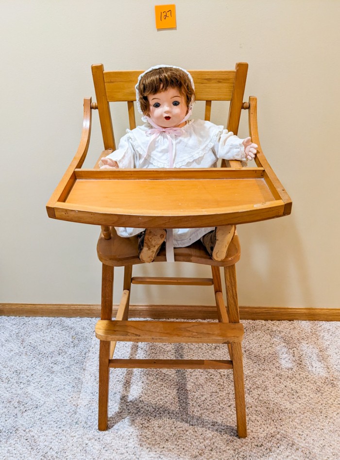 127. Highchair w/ Doll