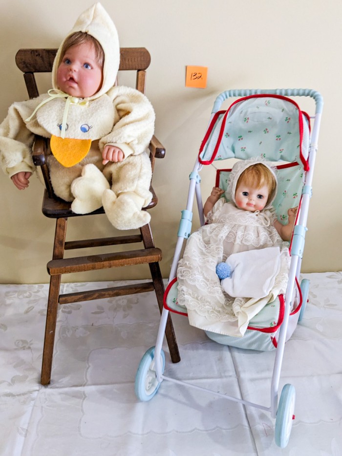 132. Highchair, (2) Baby Dolls + Stroller