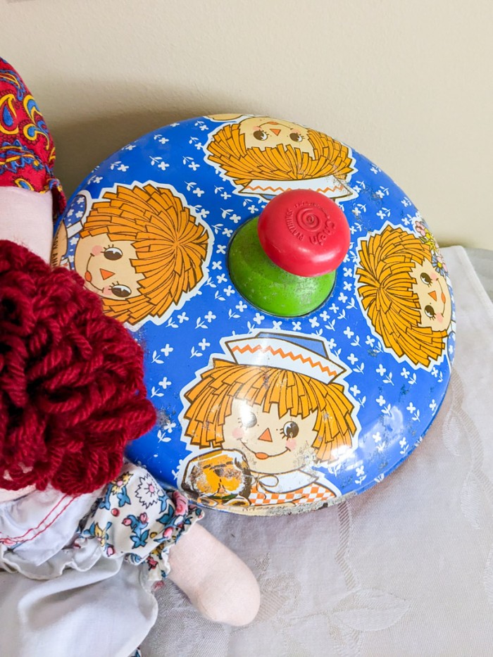 145. Vintage Tin Top, (3) Raggedy Ann Dolls + (5) Books - Image 2