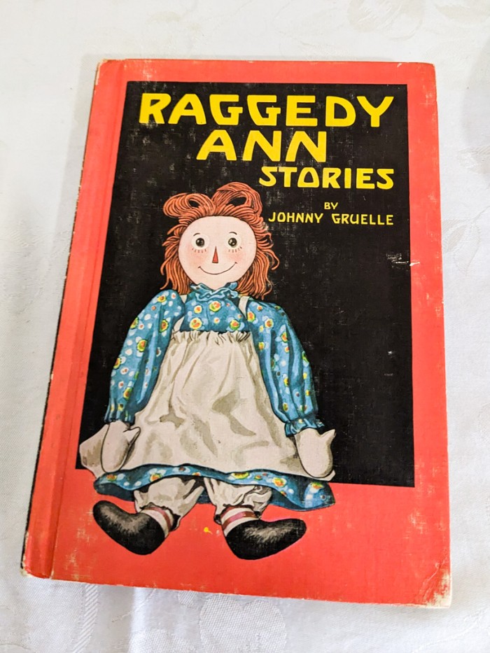 145. Vintage Tin Top, (3) Raggedy Ann Dolls + (5) Books - Image 6