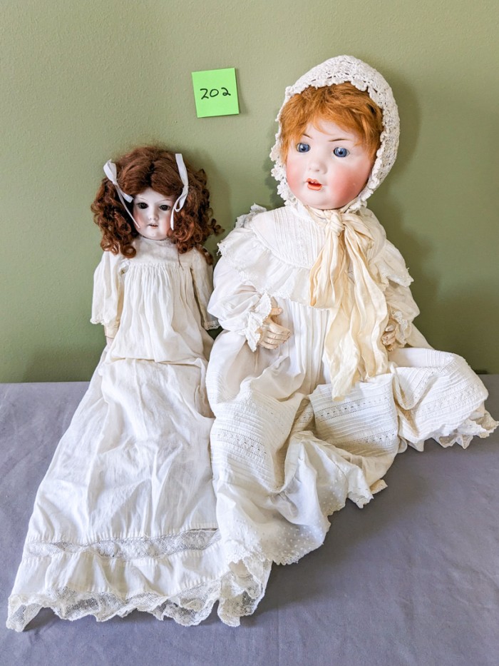 202. (2) Antique Dolls