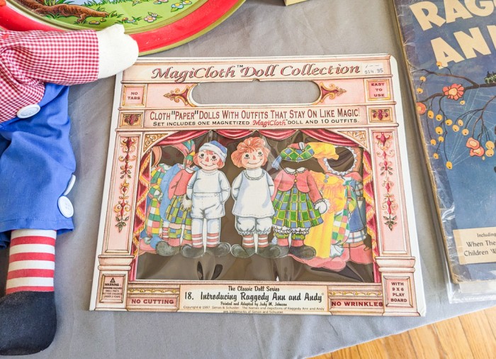 235. Raggedy Ann Dolls, Tin + Books - Image 4