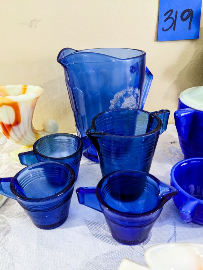 319. Shirley Temple Pitcher, Cobalt Glass Mini Cups + Akro Agate Mini Glassware, Dolls - Image 8