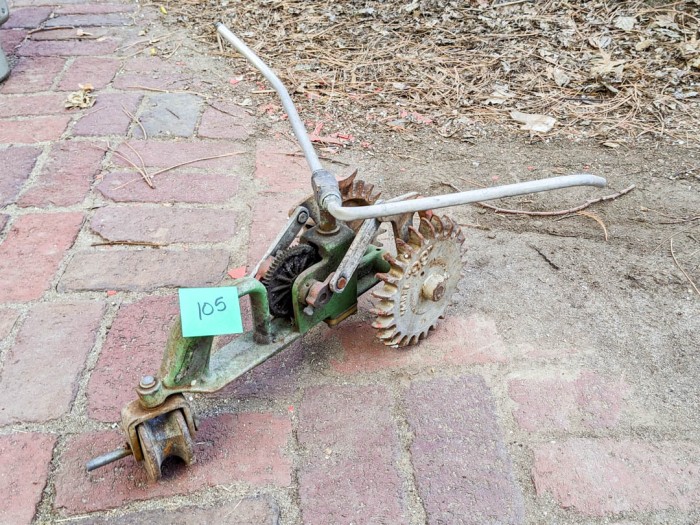 105. Vintage Metal Tractor Sprinkler