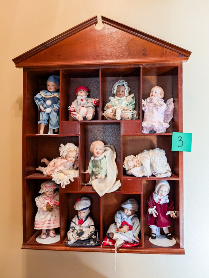 3. (11) Dolls w/ Wall Shelf