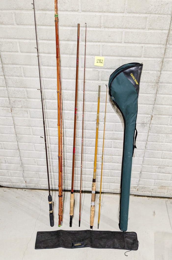 282. (4) Fishing Rods + Crystal River Case