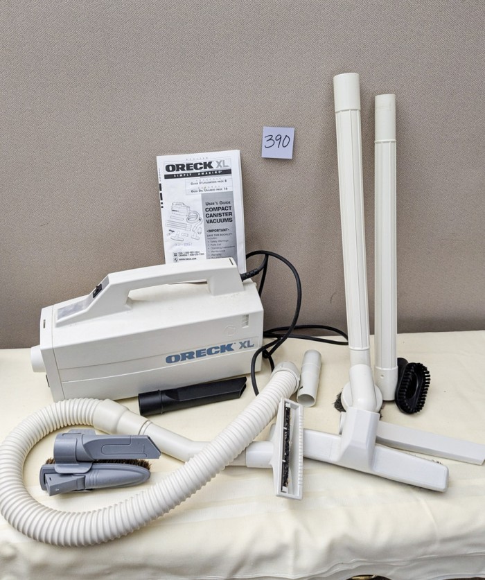 390. Oreck XL Vacuum w/ Attachments