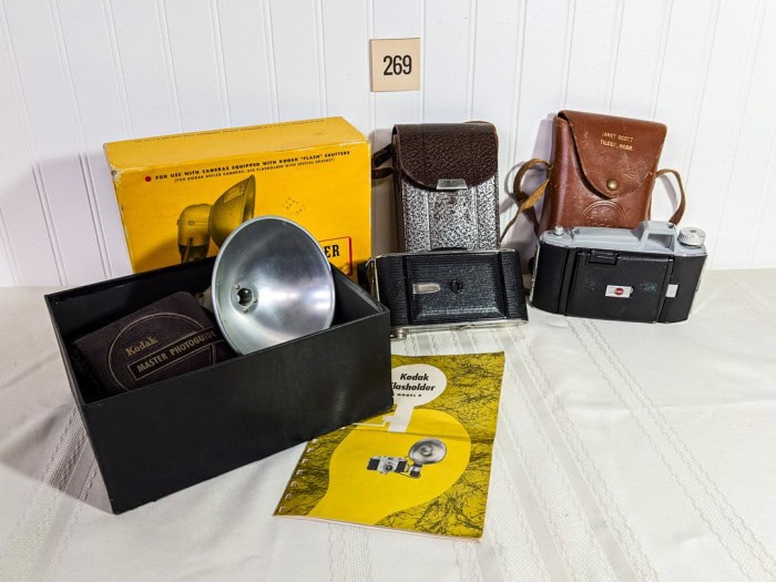 269. (2) Vintage Cameras + Accessories