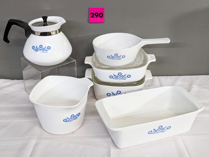 290. (2) Corningware Casseroles, Loaf Pan, Teapot + Measuring Cup