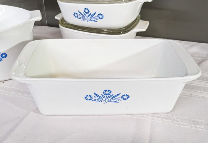 290. (2) Corningware Casseroles, Loaf Pan, Teapot + Measuring Cup - Image 6