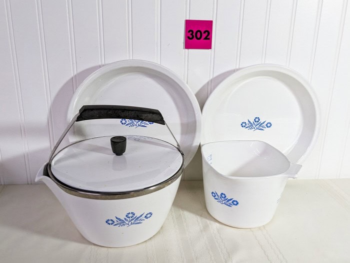 302. Corningware - (2) Pie Plates, Tea Kettle + Measuring Bowl