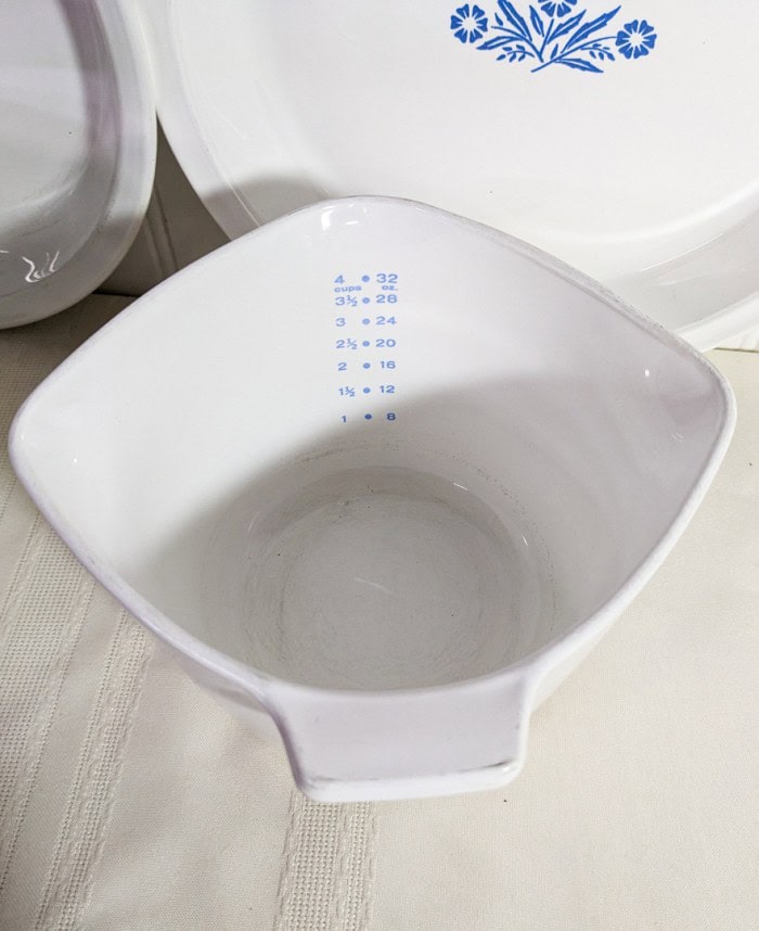 302. Corningware - (2) Pie Plates, Tea Kettle + Measuring Bowl - Image 6