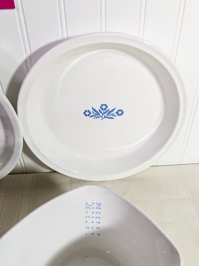 302. Corningware - (2) Pie Plates, Tea Kettle + Measuring Bowl - Image 8