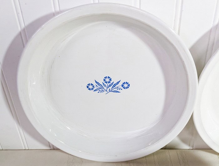 302. Corningware - (2) Pie Plates, Tea Kettle + Measuring Bowl - Image 9