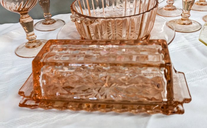 308. (2) Pink Depression Glass Plates, Butter Dish, (6) Glasses + Bowl - Image 2