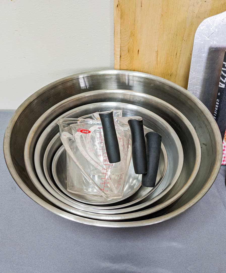 63. Mixing Bowls, Pizza Paddle, Measuring Cups + Cookbooks - Image 4