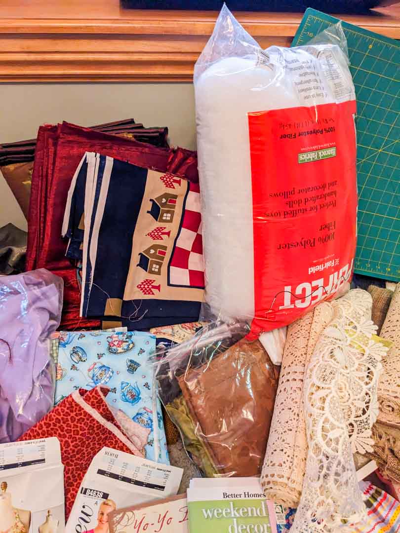 443. Sewing/Craft Lot - Fabric, Cutting Mat, Books + Notions - Image 6