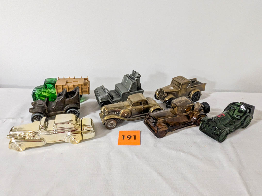 191. (8) Avon Cologne Bottles + Coin Banks