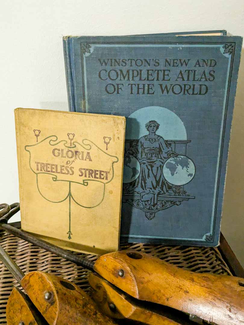 315. Christian on the Farm (signed), Basket, Shoe Stretchers, Basket, Flags + Books - Image 8