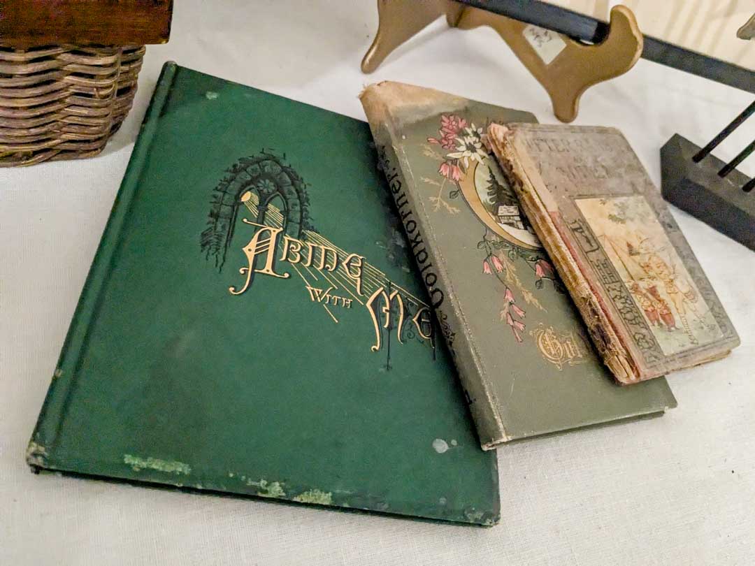 315. Christian on the Farm (signed), Basket, Shoe Stretchers, Basket, Flags + Books - Image 7
