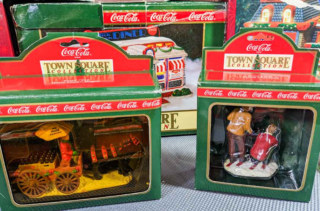 159. Coca-Cola Christmas Village Buildings + Accessories - Image 8