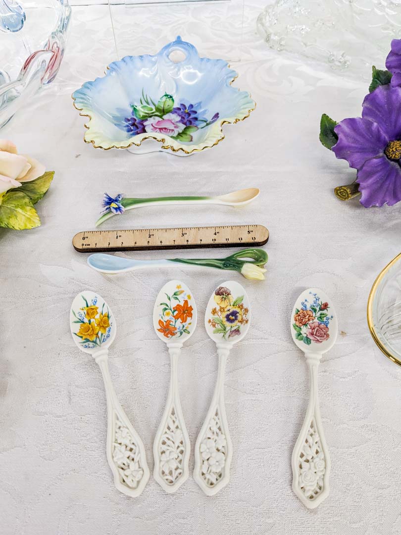 33. Floral Glassware + (2) Capodimonte Porcelain Flowers + (4) Avon Porcelain Spoons + (2) Unmarked Ceramic Spoons + 7" Crystal Bird - Image 6