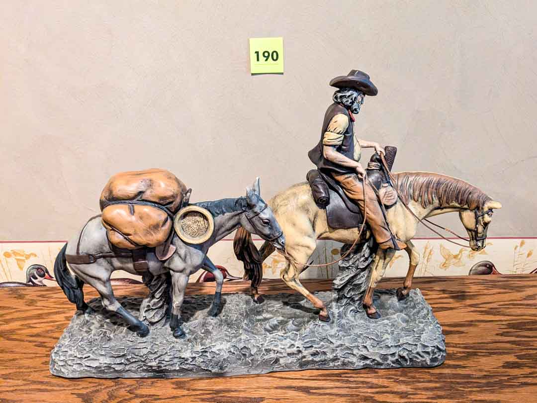 190. 14" Ceramic Cowboy Leading a Horse